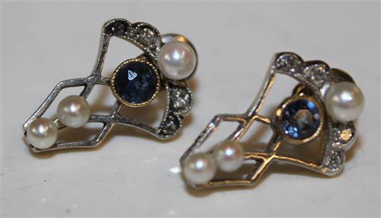 A pair of earrings
